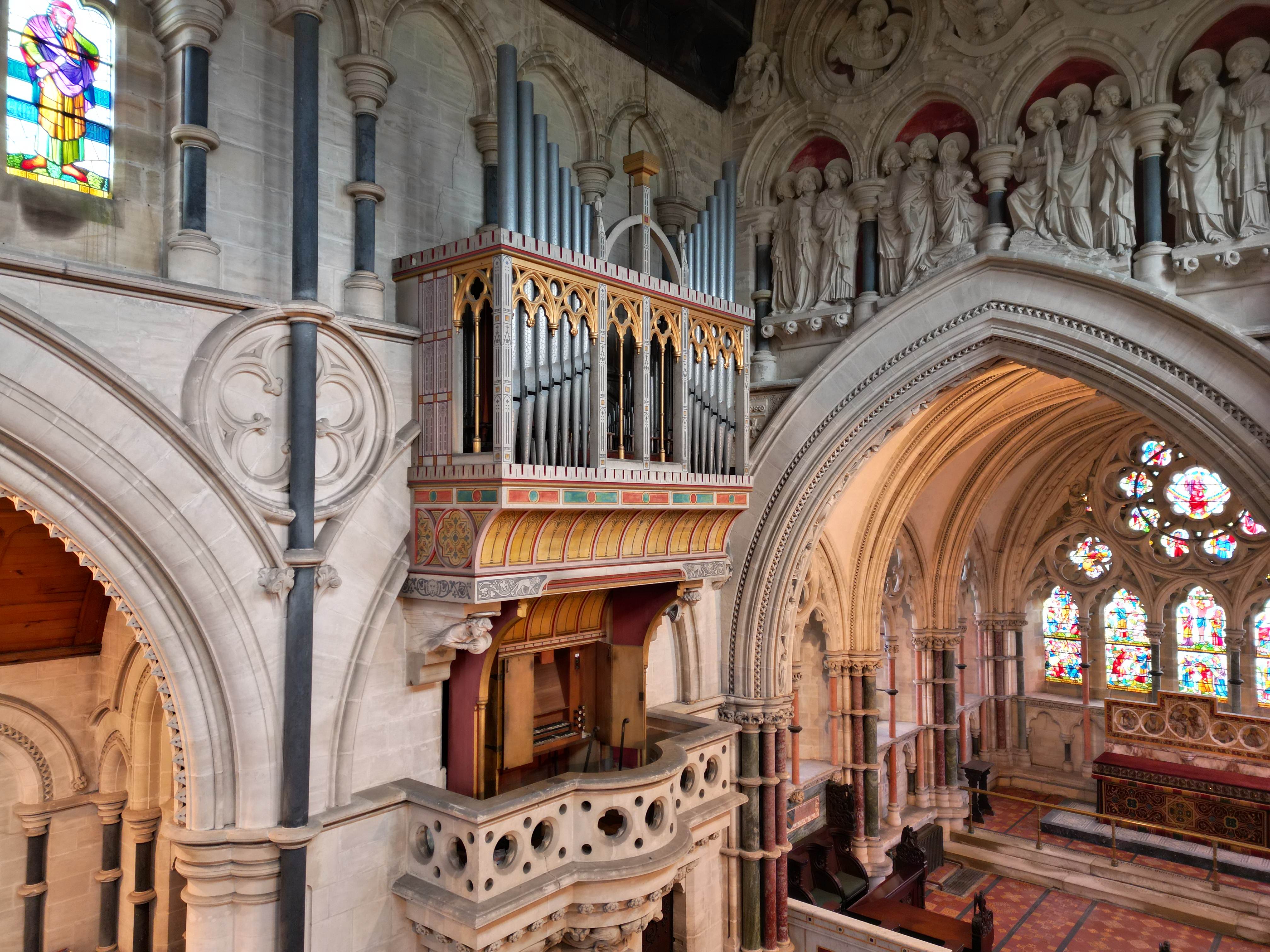 Interior — organ loft and chancel arch